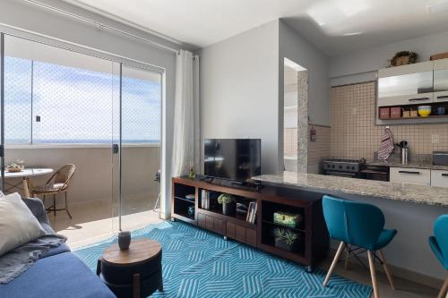 Unique Residence, próximo ao Parque e Shopping Flamboyantにあるキッチンまたは簡易キッチン