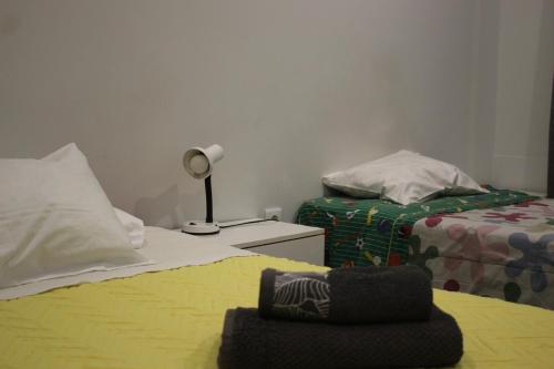 Ein Bett oder Betten in einem Zimmer der Unterkunft Apartment São MARTINHO - Aveiro