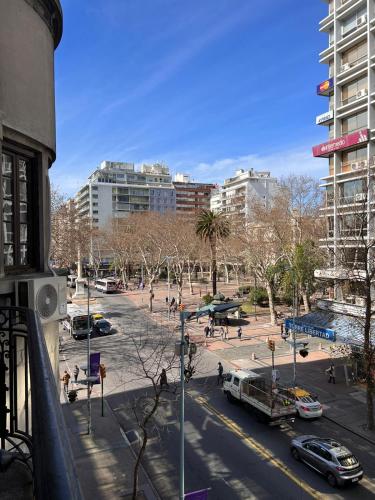 a view of a city street with cars and buildings at Nuevo Hotel Aramaya in Montevideo