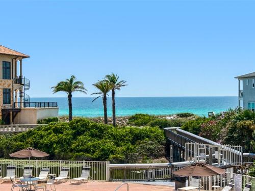 a view of the beach from the balcony of a resort at San Remo Condominium 209 by Newman-Dailey in Santa Rosa Beach
