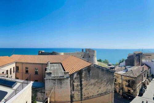 an aerial view of an old building and the ocean at Casetta 1870 in Ortona