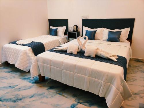 Llit o llits en una habitació de DE LUMA Beach View