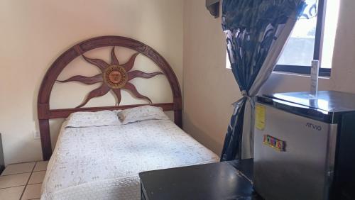 Postel nebo postele na pokoji v ubytování Casa Flores
