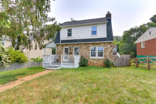a house with a fence and a yard at Chic Front Royal Retreat Near Shenandoah River! in Front Royal