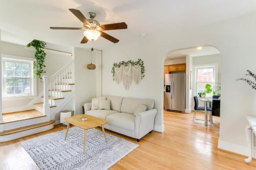a living room with a couch and a ceiling fan at Chic Front Royal Retreat Near Shenandoah River! in Front Royal