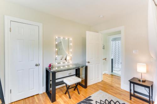 a dressing room with a desk and a mirror at Chic Front Royal Retreat Near Shenandoah River! in Front Royal