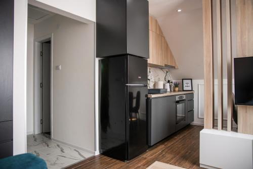 Una cocina o zona de cocina en NOMAD Apartments