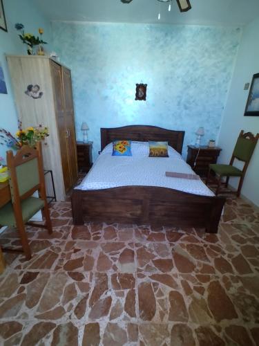 Кровать или кровати в номере LT SICILIA BELLA ROOMS