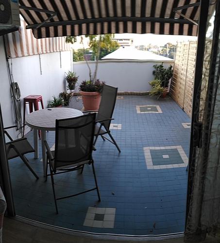 Balkón nebo terasa v ubytování soleil de Pirae