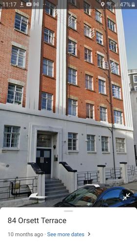 a large building with a staircase in front of it at 2 dable bedroom (65 westbourn court) in London