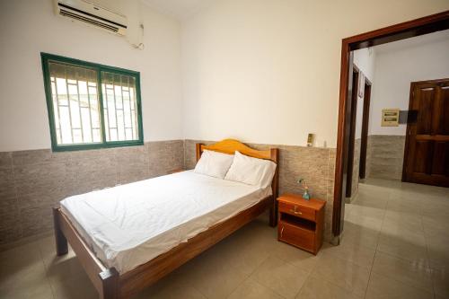 Llit o llits en una habitació de YUPOP APARTAMENTO