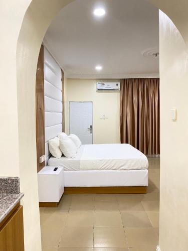 Ένα ή περισσότερα κρεβάτια σε δωμάτιο στο Elegantly furnished studio in Asokoro