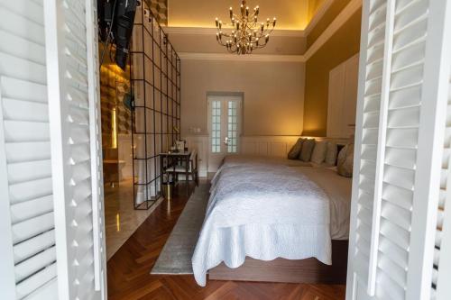 Łóżko lub łóżka w pokoju w obiekcie Hotel Boutique Margarita Toluca