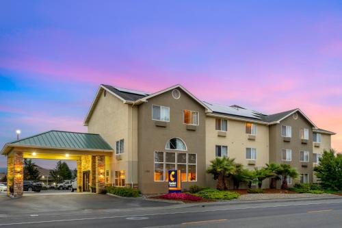 a rendering of a hotel with a parking lot at Comfort Inn & Suites Redwood Country in Fortuna