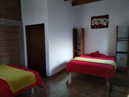 - une chambre avec 2 lits dans l'établissement Carmen Graciela, à Álamos
