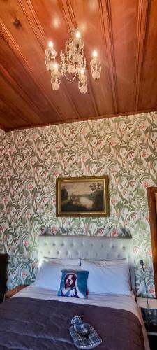 Postel nebo postele na pokoji v ubytování Pheasant Lodge