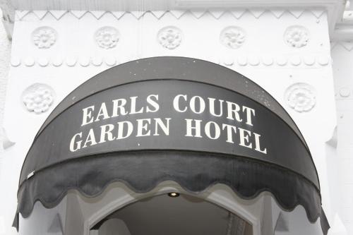 a sign on a building at Earls Court Garden Hotel in London