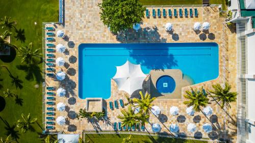 Bazén v ubytování Itapema Beach Hotel & Convention nebo v jeho okolí