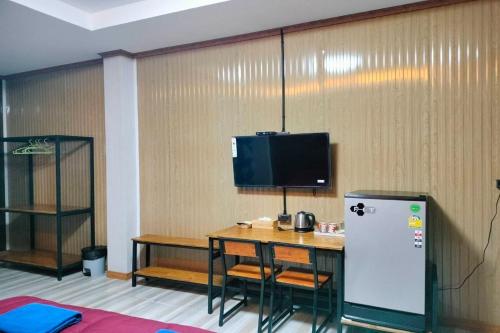 Η κουζίνα ή μικρή κουζίνα στο Pingpong Place