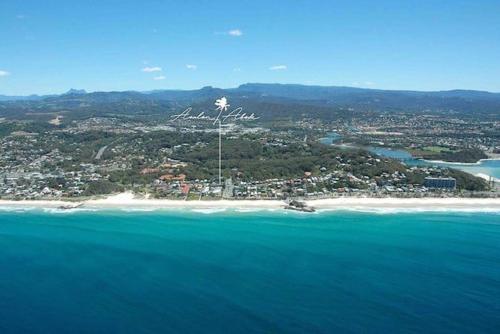 an aerial view of a beach and the ocean at Currumbin Beach 1 bedroom Studio - steps from the beach! in Gold Coast