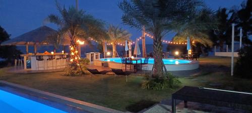 Πισίνα στο ή κοντά στο ganze Villa beachfront-pool-villa-Apartment