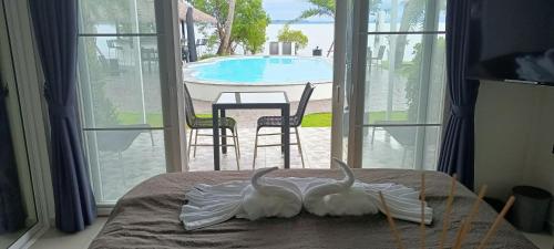 Πισίνα στο ή κοντά στο ganze Villa beachfront-pool-villa-Apartment
