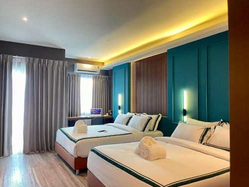 Ένα ή περισσότερα κρεβάτια σε δωμάτιο στο The Bed's 304