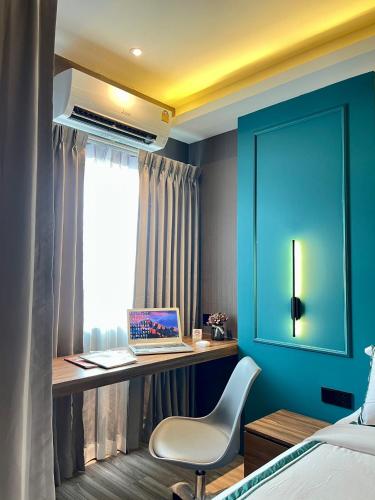 Ένα ή περισσότερα κρεβάτια σε δωμάτιο στο The Bed's 304