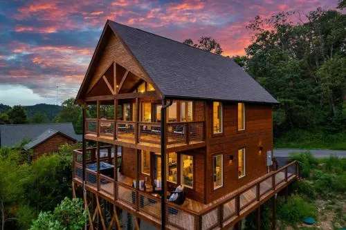 New Luxury Cabin with Stunning MountainVIEWS,HotTub, FirePit, FirePlace,2 KingBeds, 2 CoveredDecks,BBqGrill, ShuffleBoard and Pool Access photo 1