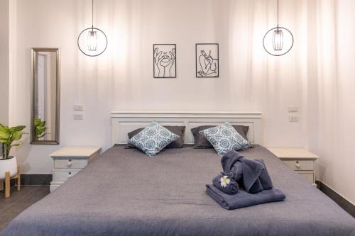 Postel nebo postele na pokoji v ubytování Apple Villas