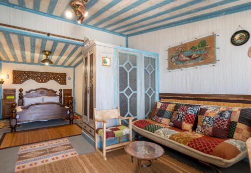 A bed or beds in a room at Container Luxury House