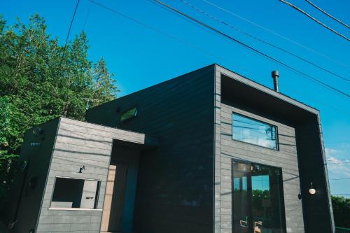 a black and gray house with a black at サウナ付き大人の隠れ家 -Kito NASU- in Nasu