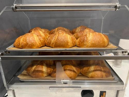 a bunch of loaves of bread in an oven at Cà Dei Barcaroli in Mestre