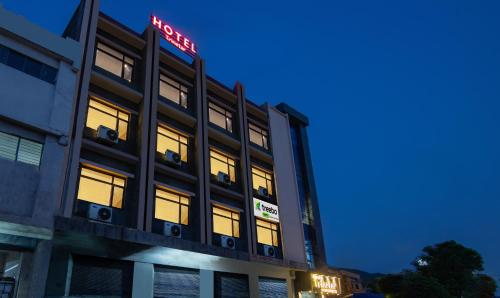 a rendering of the hotel at night at Treebo Trinetar International in Jammu