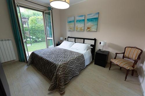Ένα ή περισσότερα κρεβάτια σε δωμάτιο στο La Perla Guest house