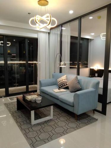 a living room with a blue couch and a table at LOVE HOME-Luxury&chill Apart Hue city-2bed-5'Trang tien in Hue