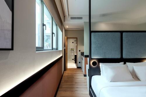 Katil atau katil-katil dalam bilik di Thirtynine Urban Stay