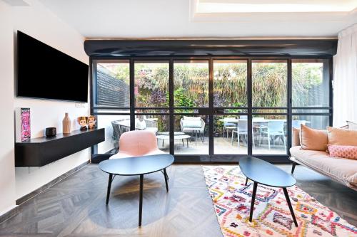 Stylish 3BR Garden Apartment Steps from the Beach