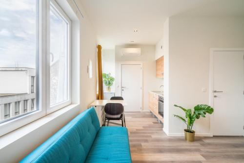 Ruang duduk di Antwerp Center Cozy Cityflats