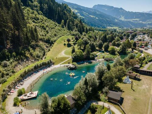 an aerial view of a river with a group of people at Apartmenthaus Wiesenhof in Aschau