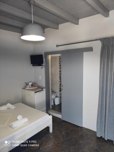 Μια τηλεόραση ή/και κέντρο ψυχαγωγίας στο Protopapas Rooms