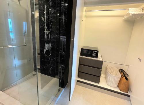 Ванная комната в Private sea view apartment at Mida Grande Resort