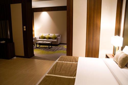 Katil atau katil-katil dalam bilik di Azar hotel