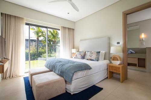 Ένα ή περισσότερα κρεβάτια σε δωμάτιο στο Villa Luxe Anahita Ile Maurice
