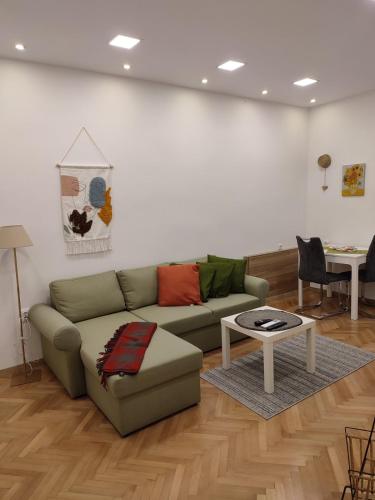 a living room with a couch and a table at Desafinado in Burgas City