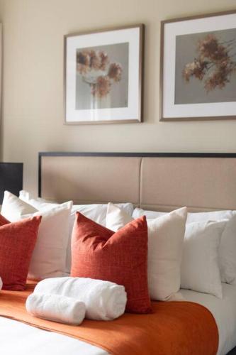 Chigwell 1BR + Study Escapeにあるベッド
