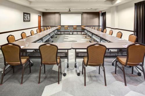 a large conference room with a large table and chairs at Hyatt Place Nashville Brentwood in Brentwood