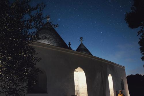 a church at night with a starry sky at Relais I Secolari in Selva di Fasano