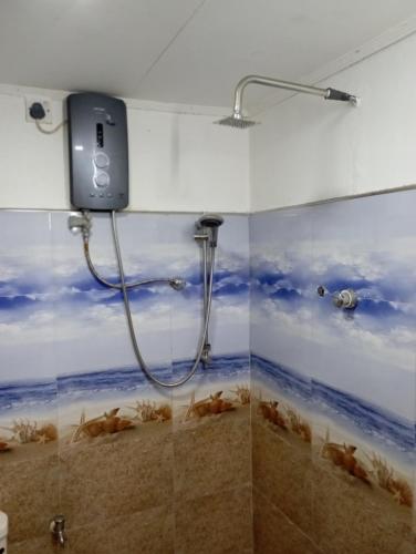 Koupelna v ubytování 152-Abhaya Place Homestay