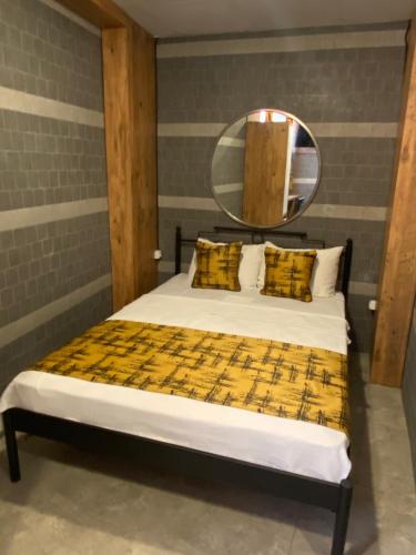 Letto o letti in una camera di M-ODA OTEL